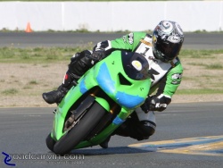 Faster rider running through turn 9a @ Buell Inside Pass Track Day Infineon